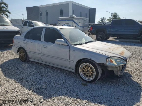 1996 Honda Civic LX with VIN 1HGEJ6573TL053548, listed as a Copart auction lot 48657435 with 118,772 mi miles and Salvage Title. Bid and sale history available at carsss.com. Image 4.