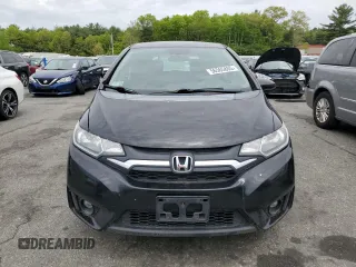 2015 Honda Fit EX-L z VIN 3HGGK5H89FM701322, wystawiony jako Copart lot #56565885 z przebiegiem 195 154 mil mil oraz Szkoda całkowita • Salvage title. Historia ofert i sprzedaży dostępna na DreamBid. Obrazek 5.