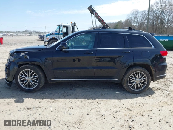 2018 Jeep Grand Cherokee Summit with VIN 1C4RJEJG2JC392847, listed as a IAAI auction lot 41751452 with 136,793 mi miles and . Bid and sale history available at DreamBid. Image 14.