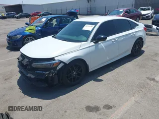 2023 Honda Civic Sport with VIN 2HGFE2F53PH513552, listed as a IAAI auction lot 42595794 with 24,674 mi miles and . Bid and sale history available at DreamBid. Image 2.