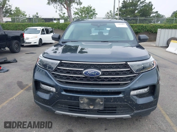 2022 Ford Explorer XLT z VIN 1FMSK7DH4NGB75826, wystawiony jako IAAI lot #42443067 z przebiegiem 85 806 mil mil oraz . Historia ofert i sprzedaży dostępna na DreamBid. Obrazek 13.