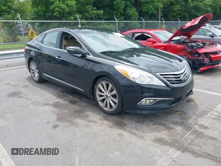 2016 Hyundai Azera Limited z VIN KMHFH4JG5GA509233, wystawiony jako IAAI lot #42465281 z przebiegiem 206 900 mil mil oraz . Historia ofert i sprzedaży dostępna na DreamBid. Obrazek 1.