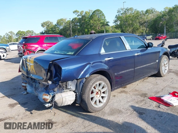 2005 Chrysler 300 300C AWD z VIN 2C3AK63H05H672425, wystawiony jako IAAI lot #42224241 z przebiegiem 143 185 mil mil oraz . Historia ofert i sprzedaży dostępna na DreamBid. Obrazek 4.