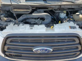 2016 Ford Transit Cargo z VIN 1FTYE1ZM0GKA05536, wystawiony jako Copart lot #65212565 z przebiegiem 146 219 mil mil oraz Czysty tytuł • Clean title. Historia ofert i sprzedaży dostępna na DreamBid. Obrazek 12.