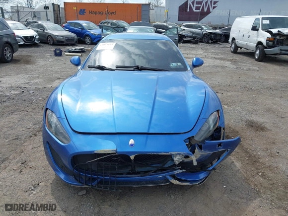 2013 Maserati GranTurismo Sport with VIN ZAM45VLA7D0073503, listed as a IAAI auction lot 41921102 with 53,436 mi miles. Bid and sale history available at carsss.com. Image 12.