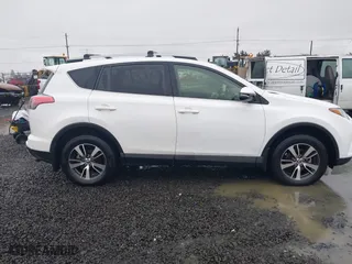 2017 Toyota RAV4 XLE with VIN JTMRFREV2HD212188, listed as a IAAI auction lot 41216790 with 79,594 mi miles. Bid and sale history available at carsss.com. Image 14.