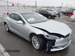 2016 Tesla Model S 70 kWh Battery with VIN 5YJSA1E17GF156514, listed as a IAAI auction lot 41869006 with 17,704 mi miles. Bid and sale history available at carsss.com. Image 1.
