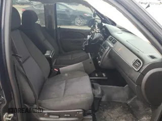 2014 Chevrolet Tahoe Commercial with VIN 1GNLC2E08ER209599, listed as a Copart auction lot 51018165 with 111,585 mi miles and Salvage title. Bid and sale history available at DreamBid. Image 7.