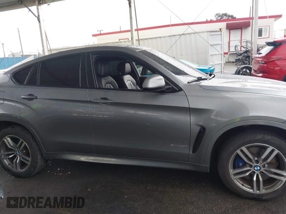 2016 BMW X6 xDrive50i with VIN 5UXKU6C59G0S82526, listed as a IAAI auction lot 41786622 with 110,796 mi miles and . Bid and sale history available at DreamBid. Image 12.