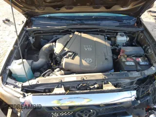 2014 Toyota Tacoma with VIN 3TMLU4EN3EM163162, listed as a IAAI auction lot 41930392 with 167,368 mi miles and . Bid and sale history available at DreamBid. Image 10.