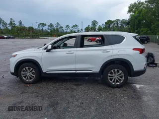 2019 Hyundai Santa Fe SE with VIN 5NMS23ADXKH038506, listed as a IAAI auction lot 42407399 with 54,540 mi miles and . Bid and sale history available at DreamBid. Image 15.