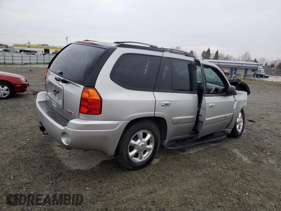 2004 GMC Envoy SLE with VIN 1GKDS13S142358446, listed as a Copart auction lot 43383935 with 154,358 mi miles and Salvage Title. Bid and sale history available at carsss.com. Image 3.