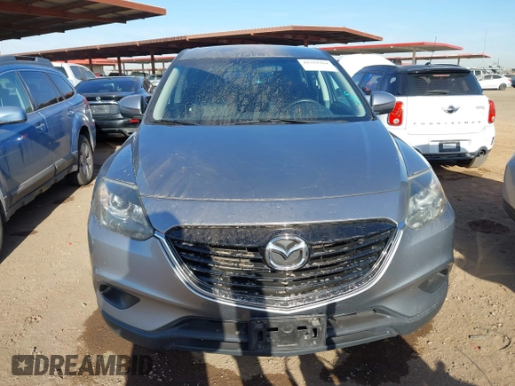 2015 Mazda CX-9 Touring with VIN JM3TB3CA7F0451472, listed as a IAAI auction lot 41559364 with 126,797 mi miles. Bid and sale history available at carsss.com. Image 12.