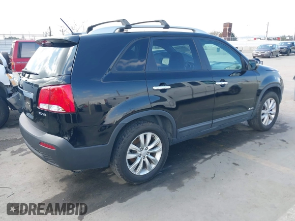 2011 Kia Sorento EX with VIN 5XYKUDA23BG036105, listed as a IAAI auction lot 41903580 with 131,529 mi miles. Bid and sale history available at carsss.com. Image 4.
