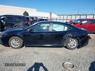2025 Toyota Camry LE with VIN 4T1DAACK5SU008670, listed as a IAAI auction lot 41821572 with 131,475 mi miles and . Bid and sale history available at DreamBid. Image 14.