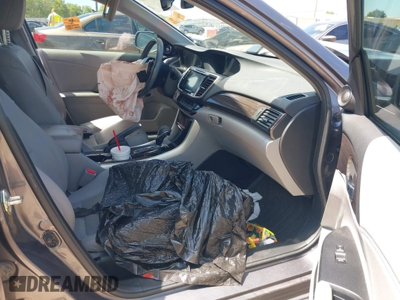 2017 Honda Accord Touring with VIN 1HGCR3F97HA041159, listed as a IAAI auction lot 42205195 with Not provided miles and . Bid and sale history available at DreamBid. Image 5.