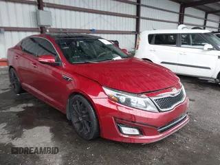 2014 Kia Optima SX Turbo with VIN 5XXGR4A60EG286453, listed as a IAAI auction lot 41661379 with 163,206 mi miles and . Bid and sale history available at DreamBid. Image 1.
