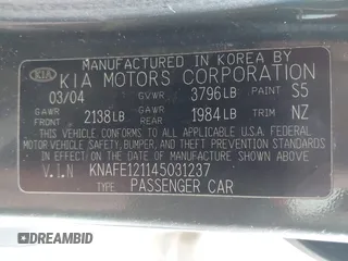 2004 Kia Spectra LX with VIN KNAFE121145031237, listed as a IAAI auction lot 41954550 with 133,744 mi miles. Bid and sale history available at carsss.com. Image 9.
