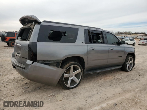 2015 Chevrolet Suburban LT with VIN 1GNSCJKC4FR263844, listed as a Copart auction lot 49231755 with Not provided miles and Salvage title. Bid and sale history available at DreamBid. Image 3.