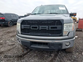 2011 Ford F-150 XLT with VIN 1FTFW1ET4BFC23725, listed as a IAAI auction lot 42018932 with 323,160 mi miles. Bid and sale history available at carsss.com. Image 13.