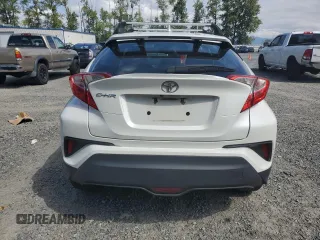 2018 Toyota C-HR XLE with VIN NMTKHMBX9JR060424, listed as a Copart auction lot 57913775 with 104,847 mi miles and Salvage title. Bid and sale history available at DreamBid. Image 6.