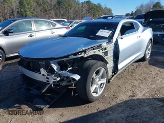 2017 Chevrolet Camaro 1LT with VIN 1G1FB1RX1H0153775, listed as a IAAI auction lot 41678960 with 138,040 mi miles. Bid and sale history available at carsss.com. Image 2.