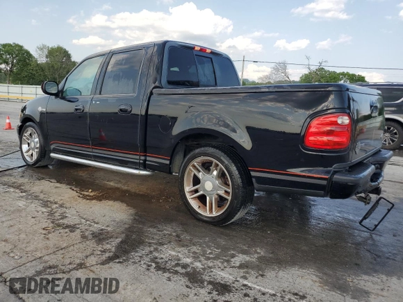 2001 Ford F-150 XLT with VIN 1FTRW07L51KA31353, listed as a Copart auction lot 59724275 with Not provided miles and Salvage title. Bid and sale history available at DreamBid. Image 2.