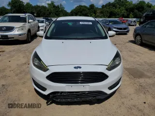 2017 Ford Focus SE with VIN 1FADP3FE9HL348123, listed as a Copart auction lot 64624965 with 58,650 mi miles and Clean title. Bid and sale history available at DreamBid. Image 5.