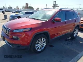 2015 Jeep Cherokee Limited with VIN 1C4PJMDB1FW599205, listed as a IAAI auction lot 41709308 with 112,415 mi miles. Bid and sale history available at carsss.com. Image 6.
