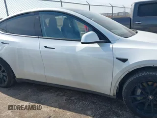 2022 Tesla Model Y Long Range with VIN 7SAYGDEE4NF428434, listed as a IAAI auction lot 41578503 with 35,460 mi miles and . Bid and sale history available at DreamBid. Image 13.