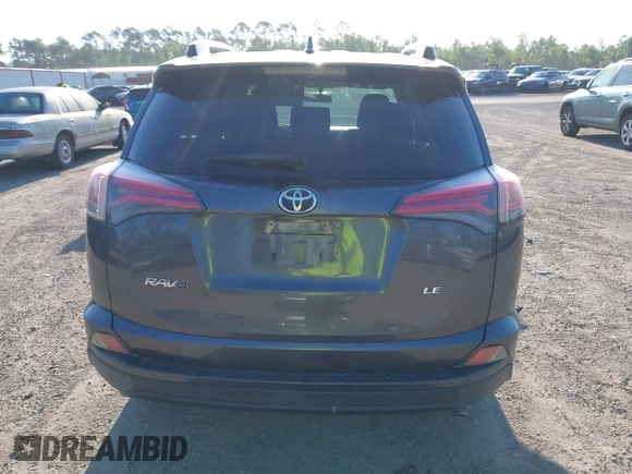 2016 Toyota RAV4 LE with VIN JTMZFREV7GJ065267, listed as a IAAI auction lot 42011267 with 180,127 mi miles. Bid and sale history available at carsss.com. Image 16.