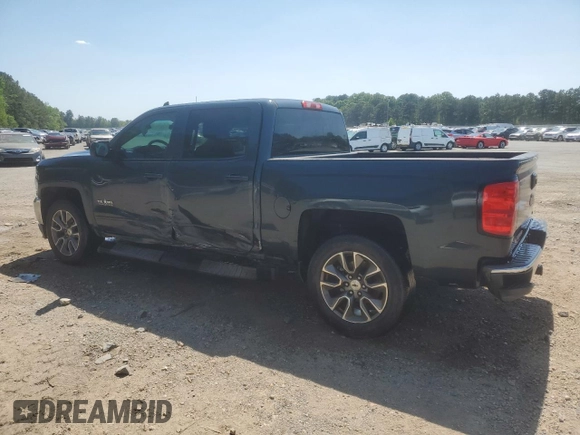 2018 Chevrolet Silverado 1500 LT with VIN 3GCPCREC1JG519228, listed as a Copart auction lot 52293035 with 102,436 mi miles and Salvage Title. Bid and sale history available at DreamBid. Image 2.