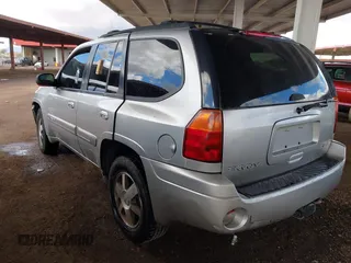 2004 GMC Envoy SLT with VIN 1GKDS13S942267554, listed as a IAAI auction lot 41754066 with 178,895 mi miles. Bid and sale history available at carsss.com. Image 3.