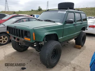 1998 Jeep Cherokee Sport z VIN 1J4FJ68SXWL210381, wystawiony jako Copart lot #58398995 z przebiegiem 211 870 mil mil oraz Szkoda całkowita • Salvage title. Historia ofert i sprzedaży dostępna na DreamBid. Obrazek 1.