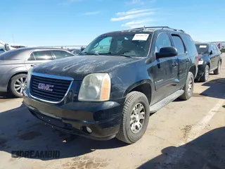 2008 GMC Yukon SLT w/4SB with VIN 1GKFK13038J238439, listed as a IAAI auction lot 41520274 with 265,855 mi miles. Bid and sale history available at carsss.com. Image 2.
