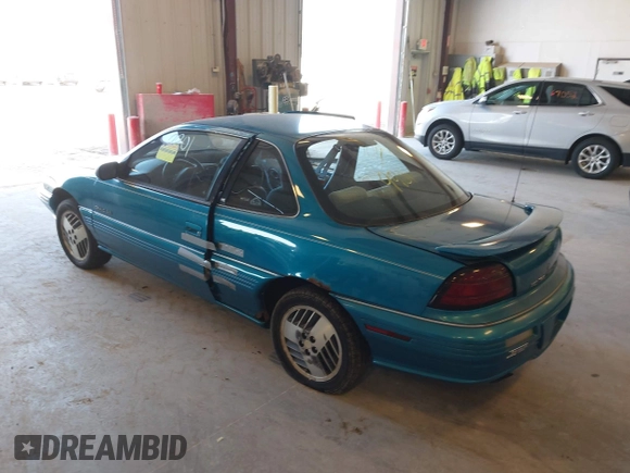 1994 Pontiac Grand Am z VIN 1G2NE15M5RM500643, wystawiony jako IAAI lot #42069901 z przebiegiem 77 129 mil mil oraz . Historia ofert i sprzedaży dostępna na DreamBid. Obrazek 3.