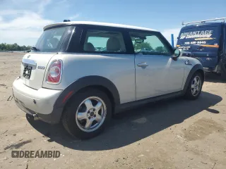 2011 MINI Hardtop with VIN WMWSU3C5XBTX96048, listed as a Copart auction lot 57607955 with 99,632 mi miles and Salvage title. Bid and sale history available at DreamBid. Image 3.