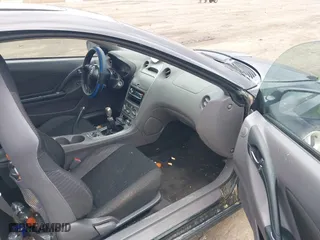 2000 Toyota Celica GT with VIN JTDDR32T7Y0006809, listed as a IAAI auction lot 41860933 with 262,014 mi miles. Bid and sale history available at carsss.com. Image 5.