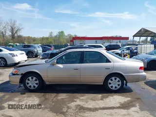 2001 Toyota Camry CE with VIN 4T1BG22K11U114688, listed as a IAAI auction lot 42065715 with 150,181 mi miles. Bid and sale history available at carsss.com. Image 14.