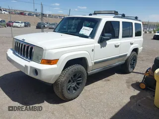 2007 Jeep Commander Sport with VIN 1J8HG48P97C601058, listed as a IAAI auction lot 42489447 with 200,103 mi miles and . Bid and sale history available at DreamBid. Image 2.