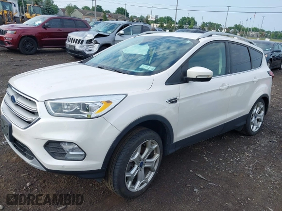 2019 Ford Escape Titanium with VIN 1FMCU9J97KUA03195, listed as a IAAI auction lot 42656589 with 40,099 mi miles and . Bid and sale history available at DreamBid. Image 17.