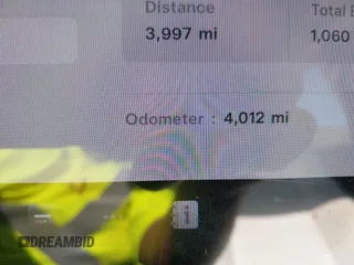 2023 Tesla Model 3 Long Range z VIN 5YJ3E1EB7PF704061, wystawiony jako IAAI lot #42079045 z przebiegiem 4 012 mil mil oraz . Historia ofert i sprzedaży dostępna na DreamBid. Obrazek 7.