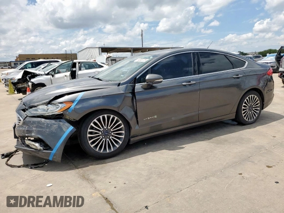 2017 Ford Fusion Hybrid Titanium with VIN 3FA6P0RU1HR368930, listed as a Copart auction lot 64965075 with 180,607 mi miles and Clean title. Bid and sale history available at DreamBid. Image 1.