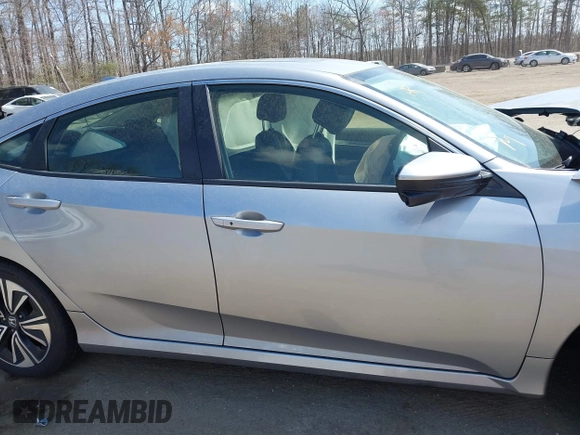 2018 Honda Civic EX-L with VIN JHMFC1F72JX043788, listed as a IAAI auction lot 41853131 with 137,266 mi miles and . Bid and sale history available at DreamBid. Image 13.