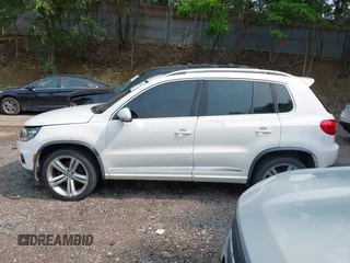 2014 Volkswagen Tiguan SEL with VIN WVGAV3AX7EW022239, listed as a IAAI auction lot 42381670 with 180,729 mi miles and . Bid and sale history available at DreamBid. Image 14.