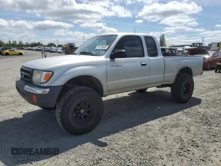 2000 Toyota Tacoma with VIN 5TEWN72N8YZ717707, listed as a Copart auction lot 54479455 with 197,407 mi miles and Salvage title. Bid and sale history available at DreamBid. Image 1.