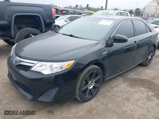 2012 Toyota Camry Hybrid XLE with VIN 4T1BD1FK5CU021639, listed as a IAAI auction lot 41627064 with 755,054 mi miles. Bid and sale history available at carsss.com. Image 2.
