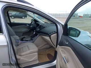 2014 Ford Escape SE with VIN 1FMCU9GX9EUA57799, listed as a IAAI auction lot 41967422 with 133,377 mi miles. Bid and sale history available at carsss.com. Image 5.