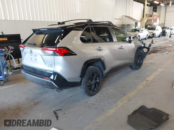 2021 Toyota RAV4 Hybrid XSE with VIN JTME6RFV9MJ006665, listed as a IAAI auction lot 41964182 with 61,654 mi miles and . Bid and sale history available at DreamBid. Image 4.