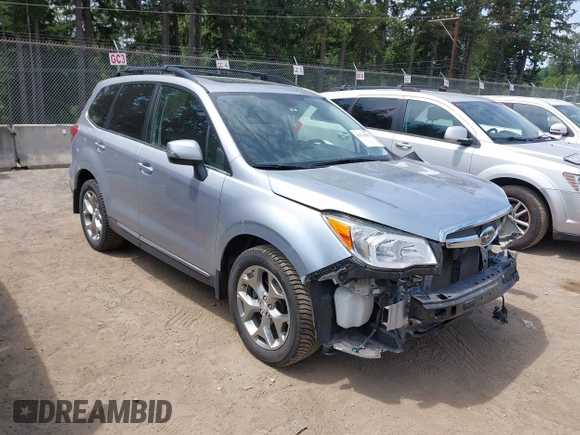 2015 Subaru Forester Touring with VIN JF2SJAWC6FH546472, listed as a IAAI auction lot 42513843 with 107,951 mi miles and . Bid and sale history available at DreamBid. Image 1.